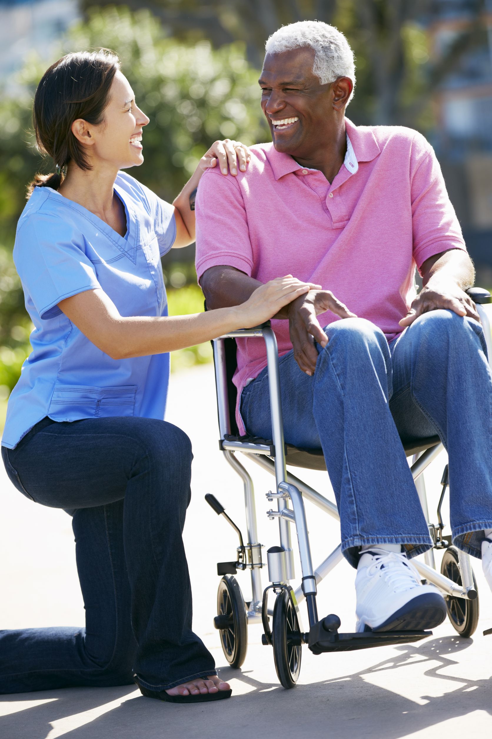 18735967 Carer Pushing Senior Man In Wheelchair 18735967 Carer Pushing Senior Man In Wheelchair
